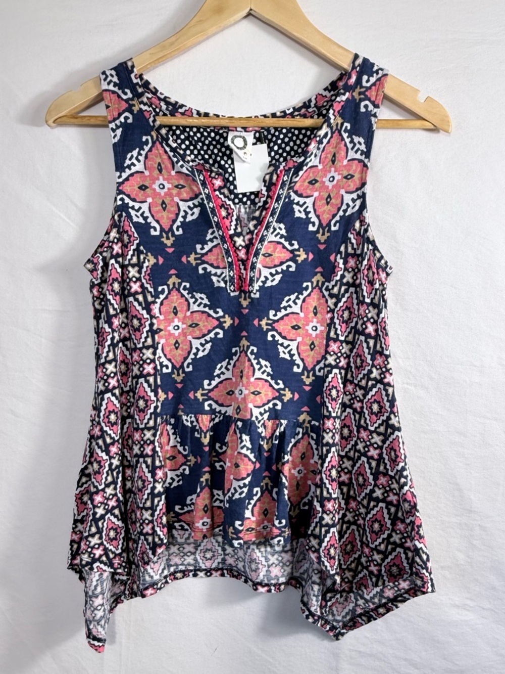 Akemi + Kin Galapa Peplum Tank Top sold at Anthropologie